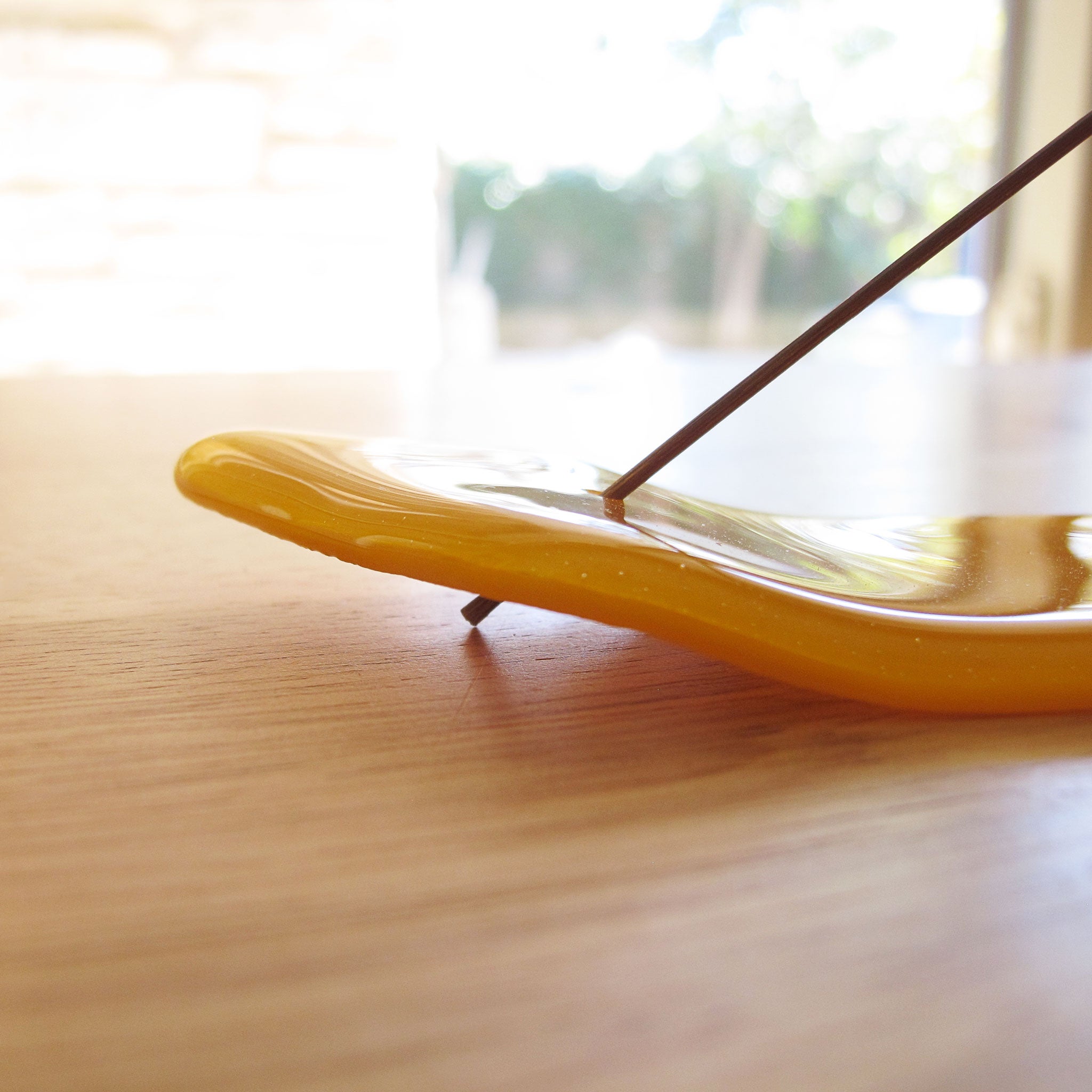 Katie Kismet yellow and white incense burner detail